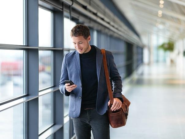 Male on phone in airport