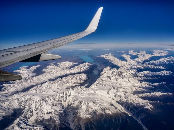 Plane wing over New Zealand