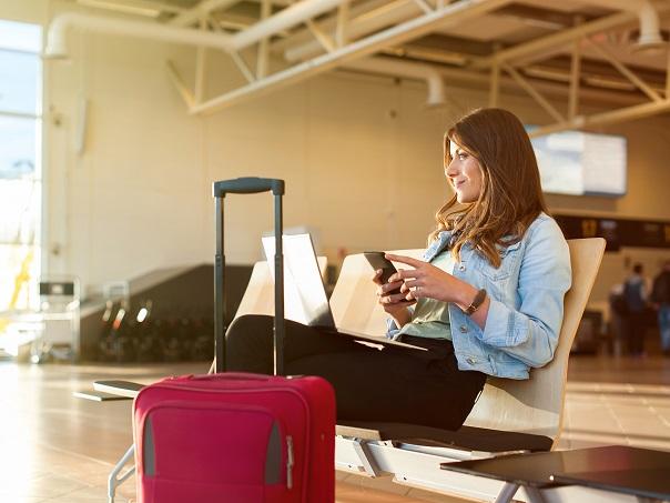 Female sitting in airport waiting for flight